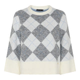 A MICHA crewneck knit sweater featuring a large argyle diamond pattern in grey and off-white, with cream ribbed trim at the collar, cuffs, and hem.